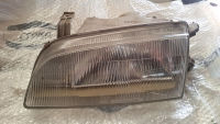 Hauptscheinwerfer links BJ.8/90   H4 12V60/55W<br>SUZUKI SWIFT