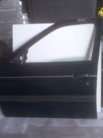 Tr links vorn T5 dunkel-grn-met.<br>FORD ESCORT VI (GAL) 1.4