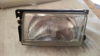 Hauptscheinwerfer links 30113754700, 1AE00631907<br>VW POLO COUPE (86C) 1.3  KAT