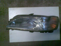 Hauptscheinwerfer links 88203990G H4 inkl. Leuchtweitenregulierung<br>PEUGEOT 306 (7B, N3, N5) 1.4 SL
